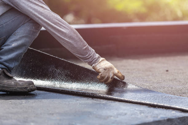 Professional Basement Waterproofing technician working in Marlboro, NJ